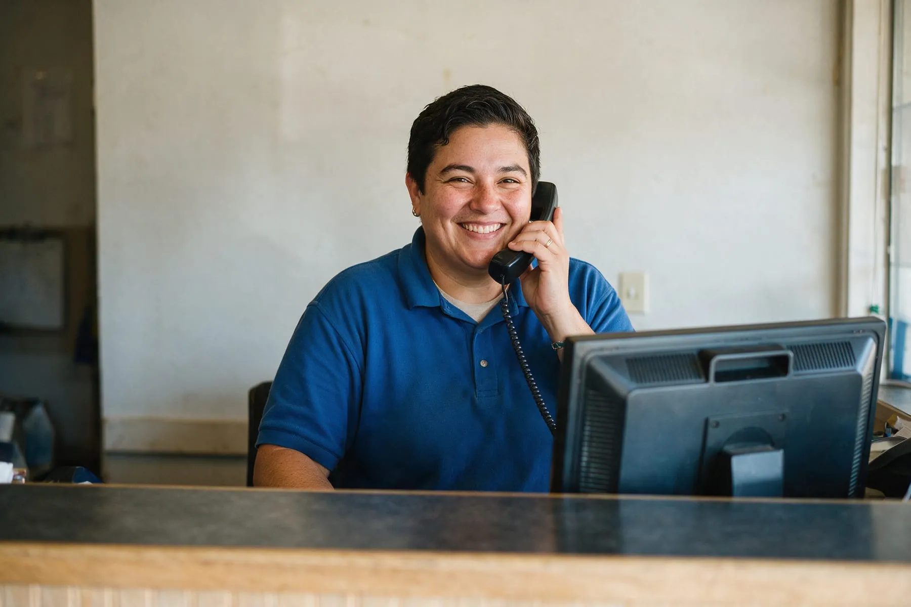 Staff member answering a new customer call from a Facebook ad