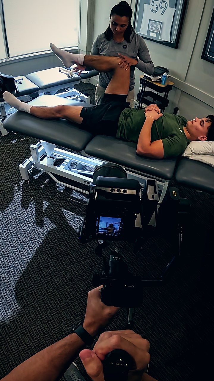 Filming a physiotherapist treating a patient in her clinic